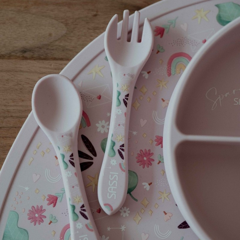 Tovaglietta per bambini in silicone rosa decorata con arcobaleni, alberi e stelle